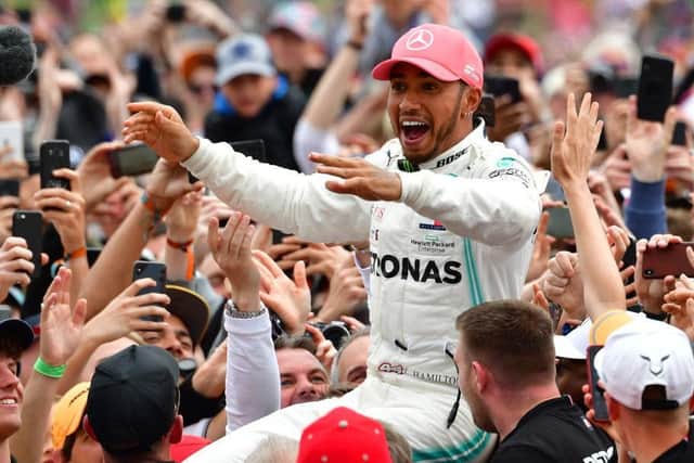 Lewis Hamilton celebrates his 2019 victory at Silverstone but there will be no fans at this year's race. Photo: GETTY IMAGES