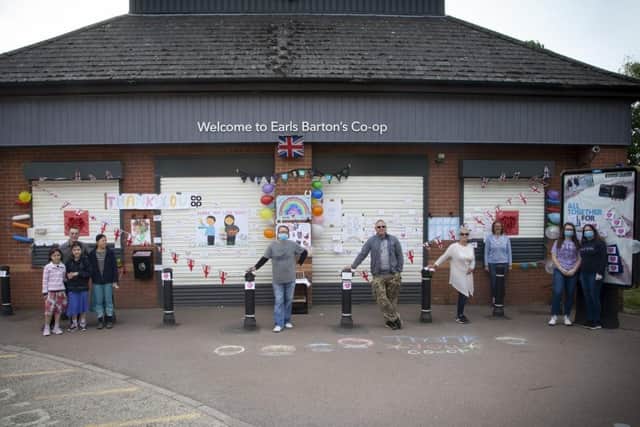 Volunteers arrived earlier to decorate the shop so staff were surprised as their shifts started. Photo: Charles Naylor.
