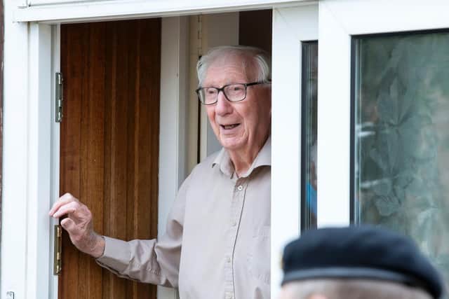 Eddie pictured on his doorstep after his friends told him to look outside for a surprise. Pictures by Kirsty Edmonds.