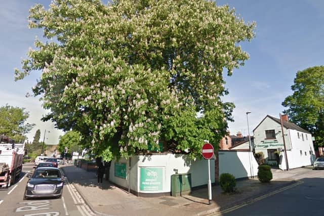 The tree has become so large it has damaged the surgery's boundary wall.