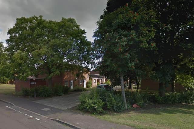 Police believe a fire outside a property in Drayton Walk was started deliberately