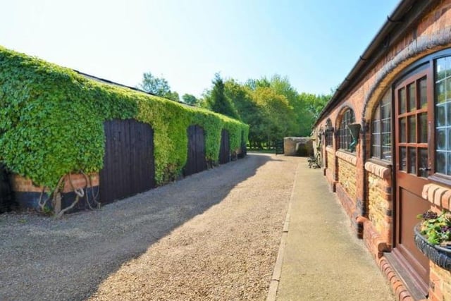 The gated driveway at the barn in Overstone. Photo: Purple Bricks