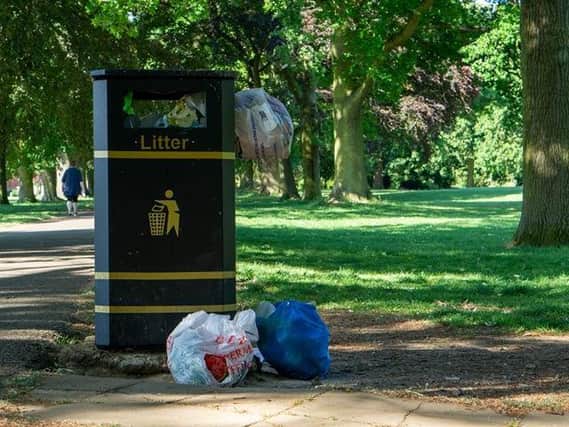Bins were overflowing in Abington Park on Sunday morning. Picture taken by Felix Lupascu.