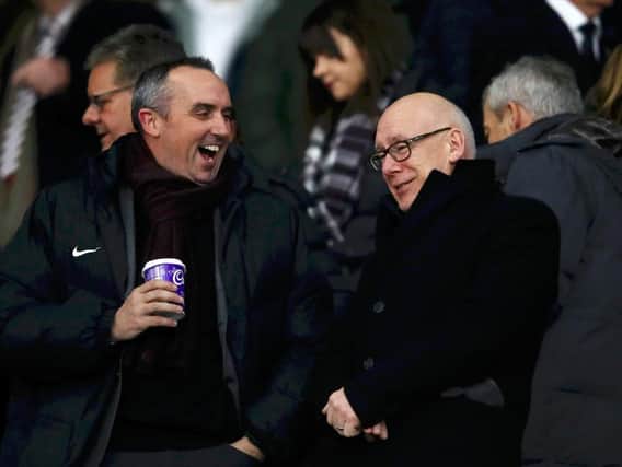 Kelvin Thomas shares a joke with Derby County owner Mel Morris during the FA Cup tie fourth round replay at Pride Park earlier this year.
