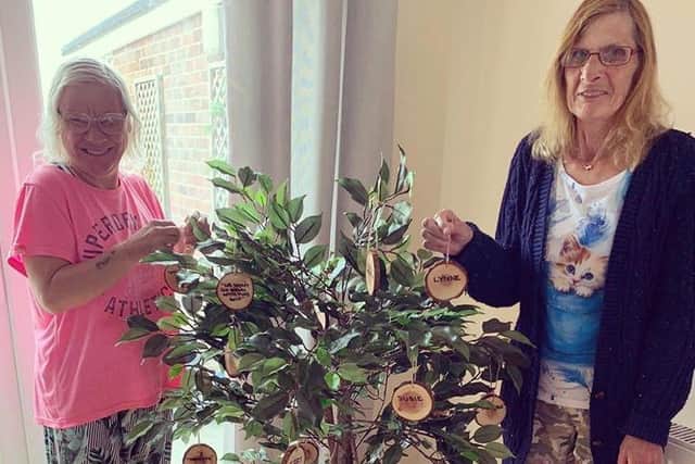 Debbie and Lynne with the tree of life that Kate helped to create.