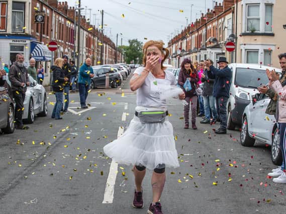 Chantelle was blown away on Saturday after her street came out to support her while she crossed the finishing line. Pictures taken by Kirsty Edmonds.