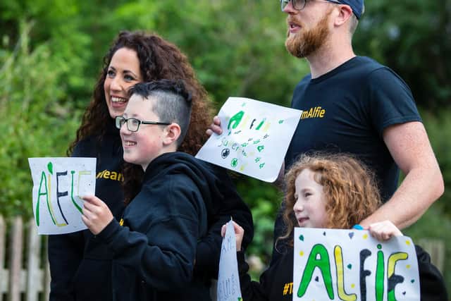 Villagers made signs for Alfie on his first day back in Blisworth. Photos by Kirsty Edmonds.