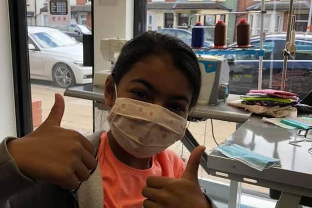 Eshani Patel came up with the idea to make and sell face masks from her father dry cleaners, Alpha, in Northampton. Photo: Kunal Patel