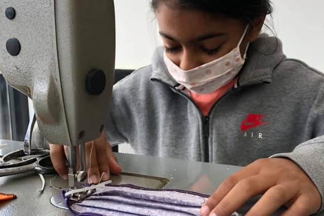 Eshani Patel making face masks. Photo: Kunal Patel