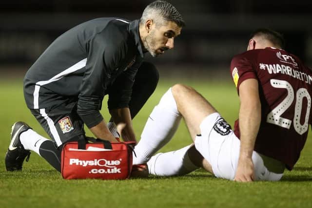 Ignacio Herrando treats Matty Warburton.