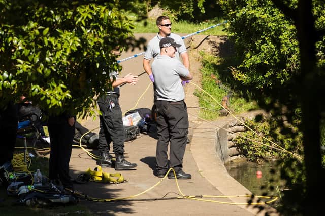 Police divers in Abington Park when they conducted an initial search two weeks ago. Photo: Leila Coker.