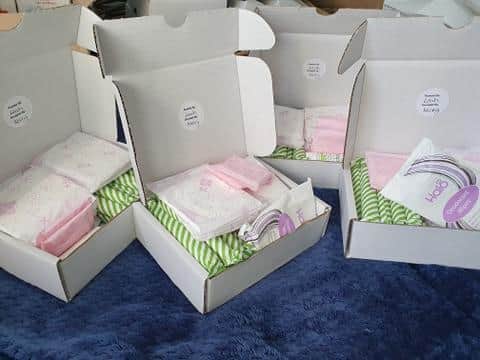 A local woman has been helping to combat period poverty by delivering boxes of sanitary products.