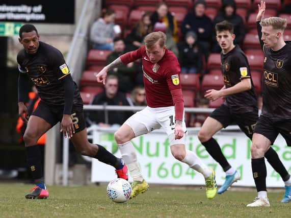 Nicky Adams and his Cobblers team-mates haven't played since losing to Mansfield Town on March 7
