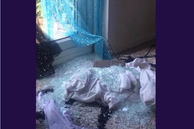 The window smashed by Kearney at Amandas house
