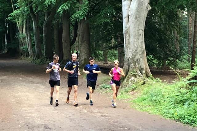 Chris completes the last lap with his family