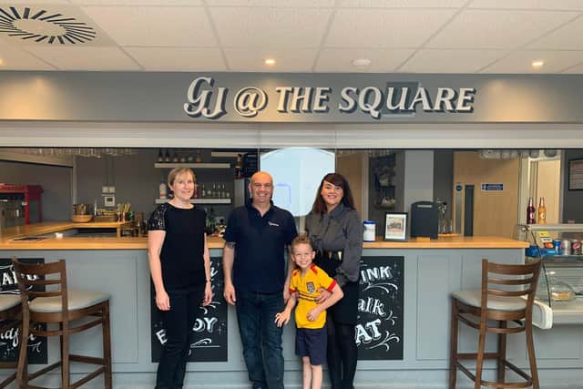 Pictured from left to right: Volunteer Lisa, Graham, his son Chester and partner Cheryl.