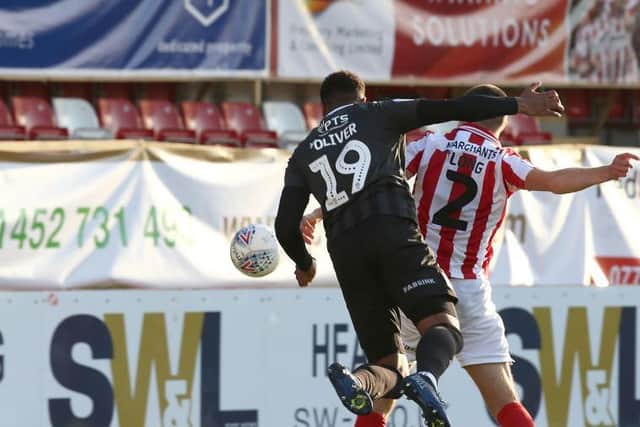 Vadaine Oliver heads the Cobblers into an early lead (Pictures: Pete Norton)