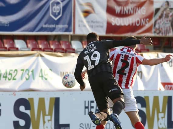 Vadaine Oliver heads the Cobblers into an early lead (Pictures: Pete Norton)