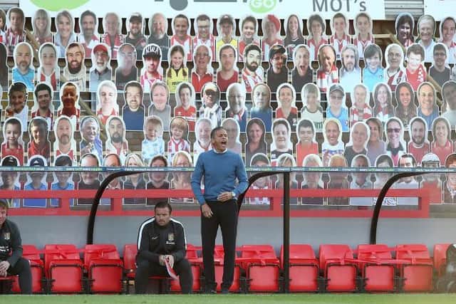 Keith Curle watches his team pull off a spectacular comeback at Whaddon Road.