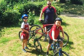 (L-R) Harry, Sam and Jack Kirchin on their bikes ready for another ride