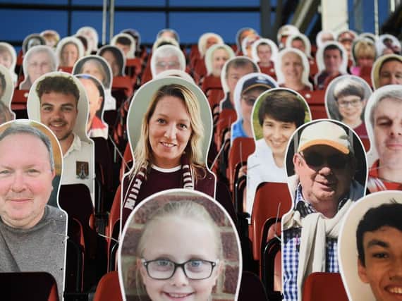 The Cobblers in the Crowd cutouts from last week's semi-final clash with Cheltenham are being transferred to Wembley for Monday's play-off final (Pictures: Pete Norton)