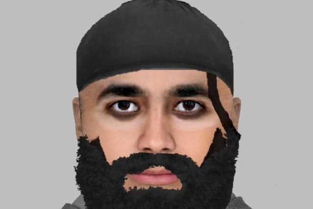 Police issued an  E-fit of a  bearded Asian man with a distinctive ringlet of hair on one side of his face