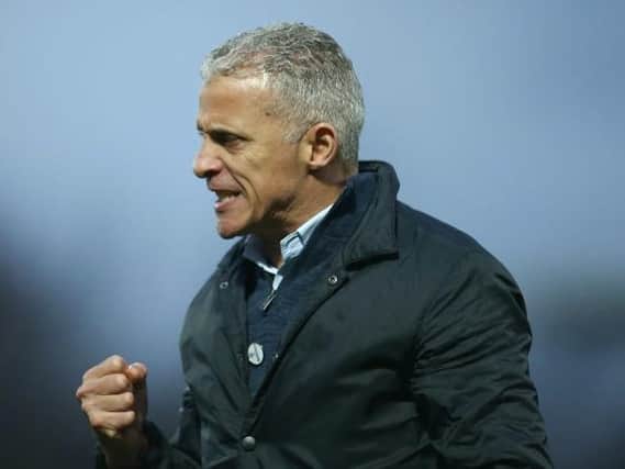Keith Curle began his managerial career in 2002 when he was appointed player-manager of Mansfield.