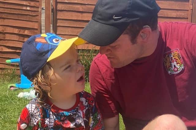 Two Cobblers supporters Lucas and Chris have formed a special bond over the years after helping each other with sign language.