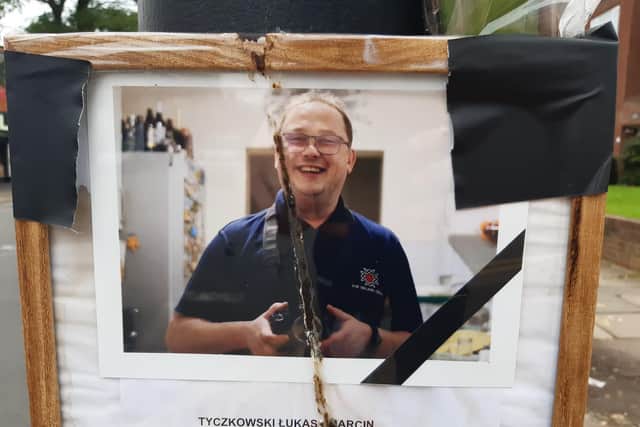 A picture of Lukas Tyczkowski has been laid alongside tributes at the scene of the crash