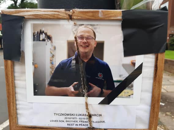 A picture of Lukas Tyczkowski has been laid alongside tributes at the scene of the crash