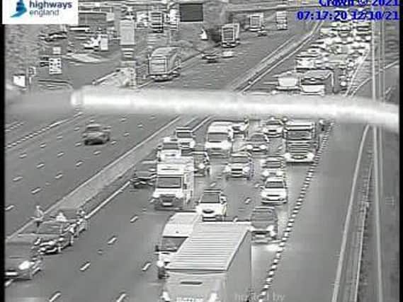 National Highways cameras showed four cars involved in the M1 shunt just after 7am