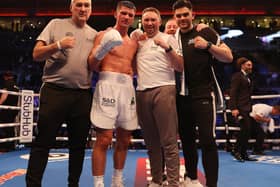Kieron Conway and the Team Shoe-Box crew celebrate Kieron Conway's win over JJ Metcalf in Liverpool on Saturday night