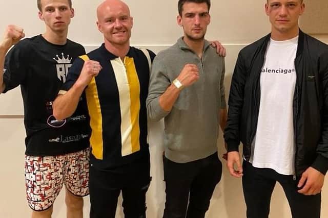 Team Shoe-Box fighers (from left) Ryan Conway, Dempsey Madden and Ben Vaughan, pictured here with Kieron Conway, all claimed debut professional wins at The Deco last weekend