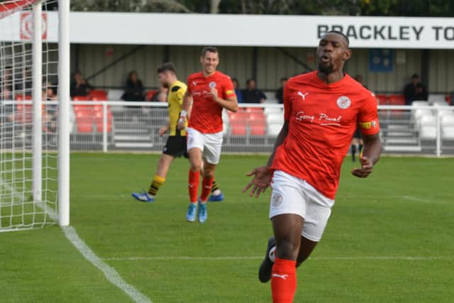 Lee Ndlovu celebrates after he scored in Brackley Town's 1-1 draw with Guiseley. Picture by Brian Martin