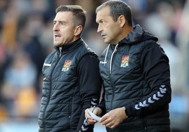 Jon Brady and assistant Colin Calderwood.