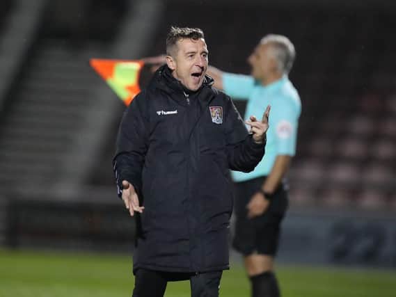 Cobblers boss Jon Brady was delighted with this team's performance in the win over Stevenage at a wet and windy Sixfields (Picture: Pete Norton)