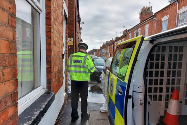 Forensics officers arriving at the scene today