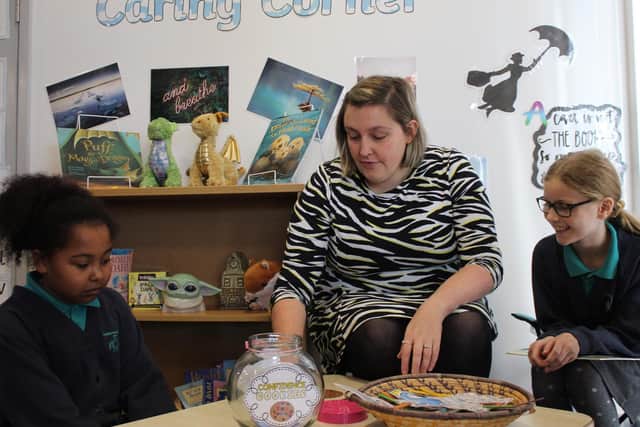 Ellie Finch, who is Castle Academy’s mental health lead, with children.