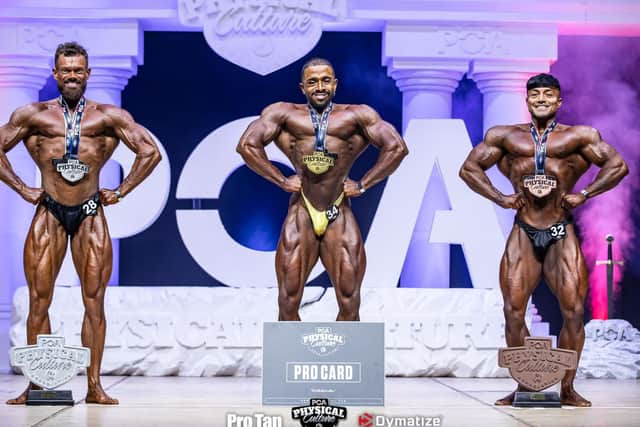 Leo (left) next to the winner (middle) and third placed bodybuilder (right)