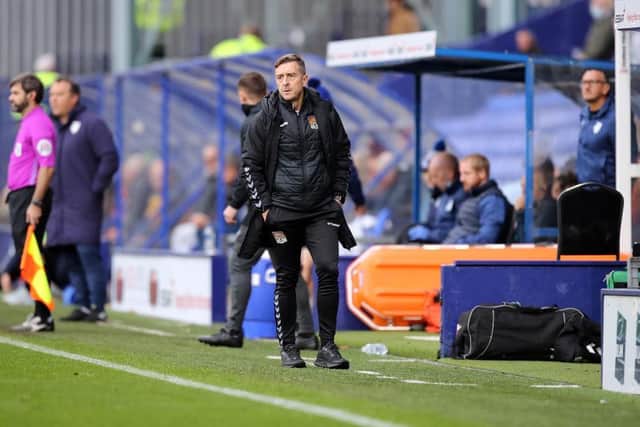 Jon Brady on the touchline at Prenton Park.