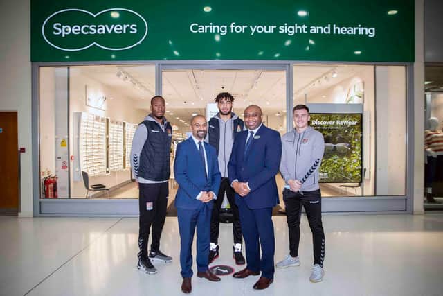 The players and coach visited Specsavers as a part of an ongoing partnership. Photo: Kirsty Edmonds.