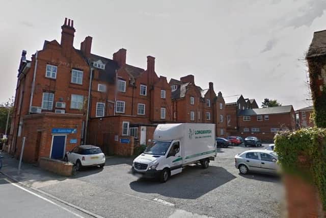 The block of flats would be built on a car park behind buildings on Billing Road, Northampton. Photo: Google
