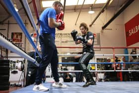 Jamie Moore at work in the gym with Chantelle Cameron