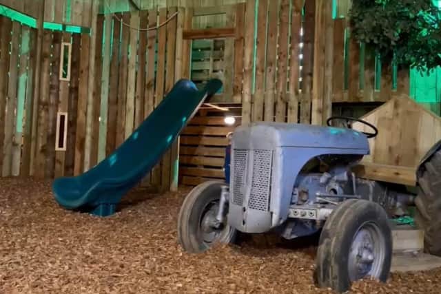 The farm offers both indoor and outdoor play areas.