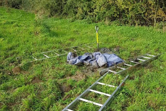 Firefighters had to use ladders and a shovel to free the pensioner from the mud.