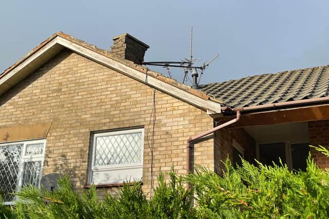 Several chimneys will need to be rebuilt after heavy aerials ripped them from roofs