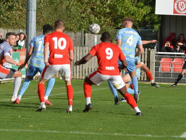 Lee Ndlovu (No.9) gets set to score the only goal of the game as Brackley Town edged out Gloucester City. Picture by Brian Martin