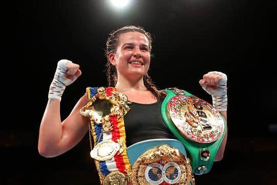 Chantelle Cameron with her world title belts