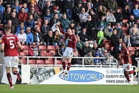 Paul Lewis celebrates his second goal against Carlisle United (Pictures: Pete Norton)