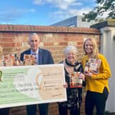 The Jeyes of Earls Barton team presents the £1,222 cheque to Northamptonshire Health Charity from proceeds of its Northamptonshire Sauce cookbook. (L-R) Michelle Leighton, Philippa Jeyes-Blackburn, David Jeyes, Georgina Jeyes and Anna Jeyes-Hulme
